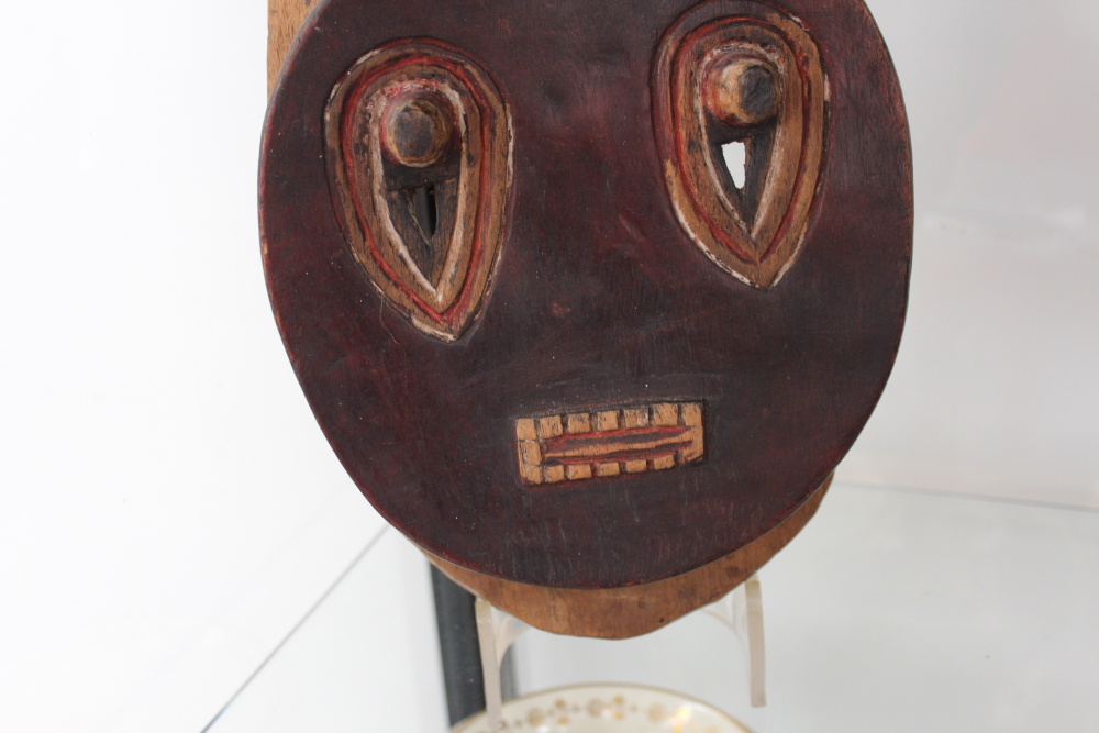 A carved and polychrome tribal ceremonial mask with horn crest, possibly African. - Image 5 of 13