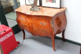 A Louis XV style marquetry inlaid two drawer commode, with shaped marble top and ormolu mounts,