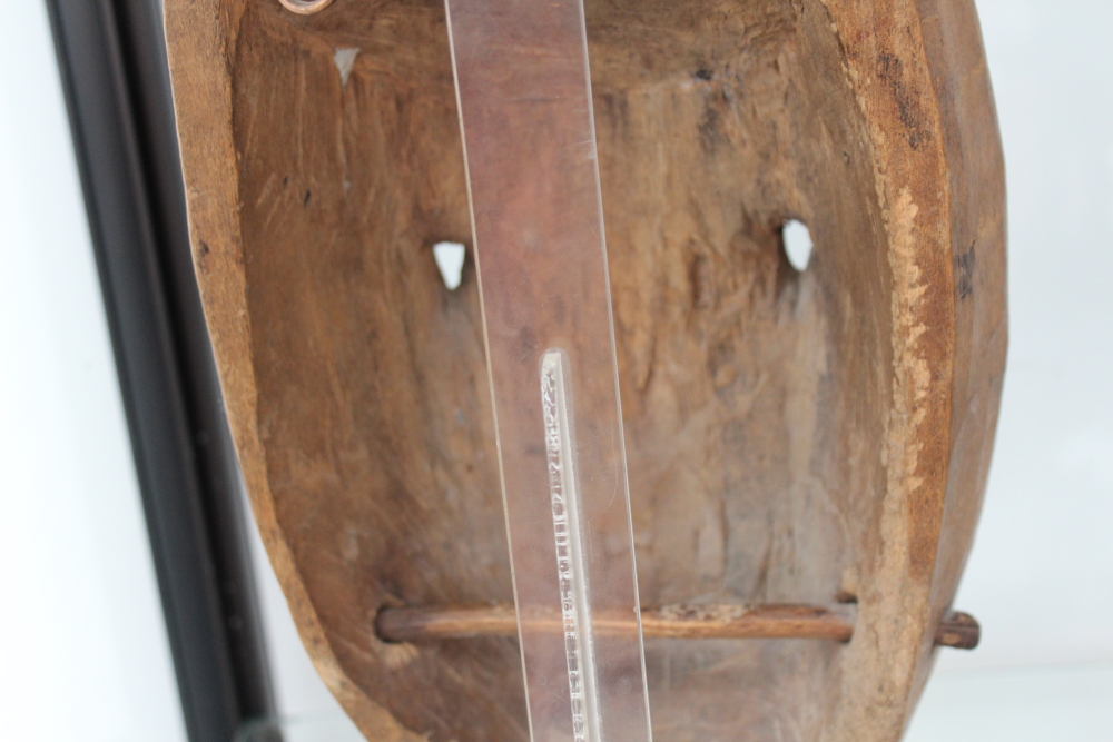 A carved and polychrome tribal ceremonial mask with horn crest, possibly African. - Image 9 of 13