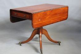 An inlaid satinwood Regency and later library table with apron end drawer, ring turned pedestal,