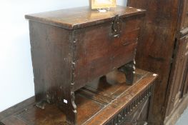 An early oak plank coffer of small proportions, 70 x 33cms