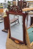 A pair of 18th Century Chippendale style wall mirrors, the fret cut frames with ho-ho bird