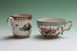 An early Worcester coffee cup, the ribbed border painted with flowers and fruit, a teacup