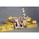 A collection of nineteen Pelham puppets, to include two skeleton, mother giraffe, horse, Disney