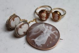 A cameo brooch and three cameo rings. (4)