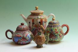 A Chinese Canton teapot decorated in famille rose polychrome enamels, 12cm high, and three other