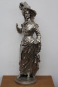 A large silver plated bronze figure of a lady in classical dress, signed to base "Roncouret",