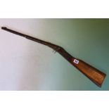A BSA underlever tap loading air rifle, serial no. S21159 together with an early tinplate Diana