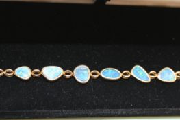 An Australian opal set bracelet