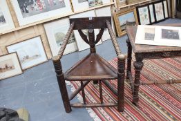 A pair of late Victorian oak turner's chairs, of traditional design