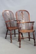 A pair of 18th/19th Century yew wood and elm Windsor armchairs, with pierced splat backs