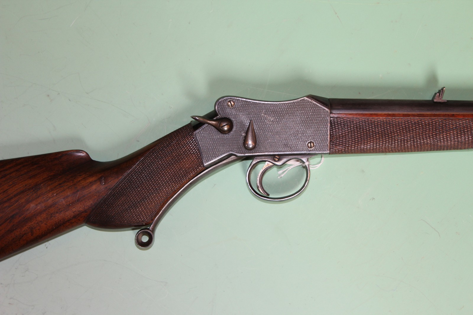 A W.H Tisdall .22 hornet single shot underlever rifle, serial number 25462. (st no. 3165)