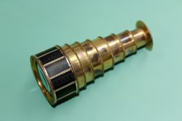 A late Georgian pocket telescope by Adams London, seven gilded brass extensions together with carved