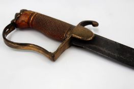 A Georgian Light Cavalry Officer’s sabre, 80cm curved blade, worn, copper gilt stirrup hilt, the