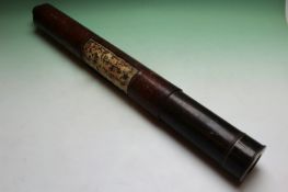 A 19th Century brass telescope with leather upholstery brass cap. 61cm long. 6.5cm diameter.