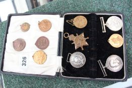 Two World War I medals. Together with various society medals