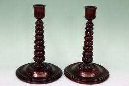 A pair of vintage tapering bobbin turned oak candlesticks. Each mounted with a plaque “made from