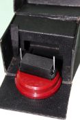 A rare Lucas Bakelite desk tidy with magnetic action in a presentation box.