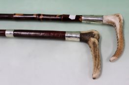 A vintage leather bound riding crop with antler handle and silver mounts inscribed “GHM 60th Rifles”