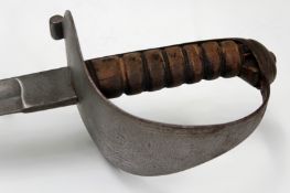 An 1889 Pattern Naval cutlass, 71cm blade, regulation steel bowl guard with turned rim and ribbed
