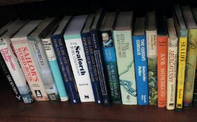 A group of books relating to sailors, seamanship and historic voyages.