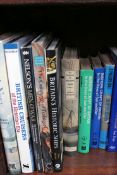 A group of books about various marine artists, Nautical antiques and ship models.