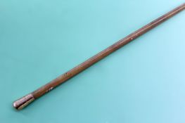 A rhinoceros horn riding crop with gold coloured mount. Dated 1863 69cm long.
N.B.Non EU buyers
