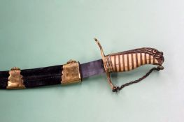 A Georgian Naval Officer’s Dirk, 31cm sharply curved blade, copper gilt hilt with lion’s head pommel