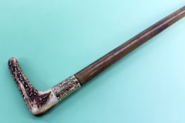 A child’s rhinoceros horn riding crop with 12ct gold mount. Dated 1868 71cm long.
N.B.Non EU buyers