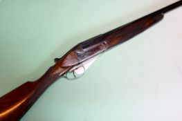 A Fine single barrel 12g shotgun regulated by Holland and Holland. Serial No 109927/20077 (St No.