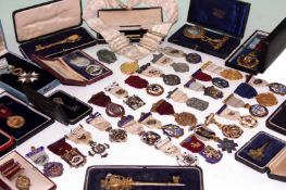 An extensive collection of Masonic jewels and badges. Principally silver and silver gilt together