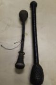 Two antique weighted cudgels