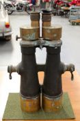 A rare pair of Japanese naval military binoculars. With graticule sight and focusing eye pieces.