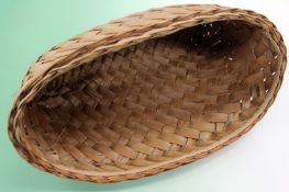 South Seas woven palm oval basket. Reputedly made on Pitcairn Island by a descendant of Fletcher