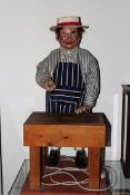 An interesting advertising automaton in the form of a butcher. Labelled “J H Animation”.