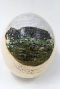 An unusual souvenir vintage ostrich egg decorated with a view of Cape Town.