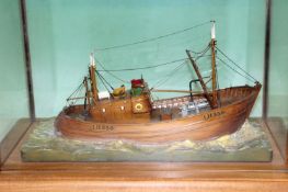 A cased scratch built model of a Scottish Sea, trawler. Port of Leith. Registered “LH359”. Case 51cm