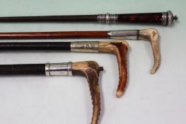 A Tortoiseshell mounted riding twitch and three silver mounted riding crops.