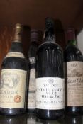 A bottle Taylors 1972 vintage port, bottle Chateau Clauss 1971 and two further bottles