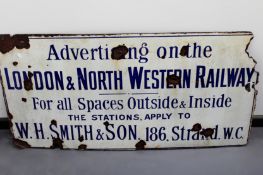 An enamel sign “Advertising on the London and North Western Railway - For spaces outside and