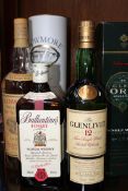 Bowmore surf single malt Scotch whiskey together with Glen Ord single malt, Glenlivet single malt,