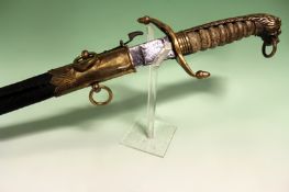 A Naval Officer’s dirk, 45cm pitted blade, regulation brass hilt with lion’s head pommel, white