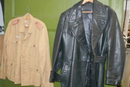 A WWII Luftwafe Africa Corps jacket and a leather overcoat