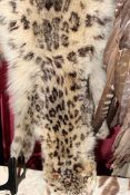A large antique snow leopard pelt.