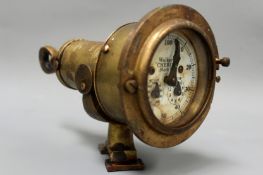 A vintage brass cased ships log. Enamel dial signed Walker’s “Cherub” mark III.