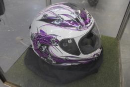 Two modern motorcycle crash helmets in near new condition.