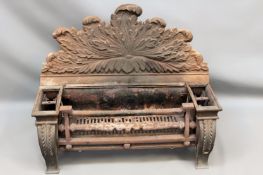 A large and impressive 19th Century cast iron fire grate in the Regency taste. Swirled acanthus leaf