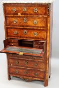 A Louis XVI secretaire semanier. Inlaid kingwood and tulipwood, shaped marble top above three long