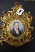 A mid 19th Century oval portrait miniature of John Stacey of Church Street Sheffield. 7 x 6cm.