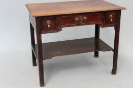 A Georgian country oak lowboy fitted with three frieze drawers and undershelf. 92cm wide x 59cm